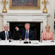 Donald Trump delivers remarks beside Iowa Governor Kim Reynolds, far left, Apple CEO Tim Cook, left, Ivanka Trump, right, and Johnny C. Taylor, Jr., CEO of the Society for Human Resource Management, far right, during a meeting with the American Workforce Policy Advisory Board inside the State Dining Room of the White House on March 6, 2019 in Washington, DC.
